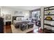Comfortable main bedroom showcasing a plush bed, wood floors, and elegant décor at 3638 Peachtree Rd # 306, Atlanta, GA 30319