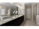 Bathroom featuring dual sinks, granite countertops, and separate shower and tub at 1760 Grand Oaks Drive, Woodstock, GA 30188