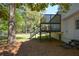 Backyard featuring a dark-stained deck, steps to yard and ample space for outdoor activities at 2157 Tiffany Ln, Lithonia, GA 30058