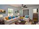 Bright living room featuring neutral tones, and large window at 2157 Tiffany Ln, Lithonia, GA 30058