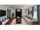 Cozy living room with modern furniture, a fireplace, and bright windows at 2157 Tiffany Ln, Lithonia, GA 30058