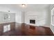 Spacious living room with hardwood floors and a fireplace feature at 2205 Dresden Nw Grn, Kennesaw, GA 30144