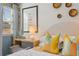 Bright bedroom with decorative pillows, a modern light, and playful wall decorations at 465 Madison Lakeview Dr, Acworth, GA 30102