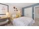 Comfortable bedroom featuring stylish decor, a cozy bed, and ample closet space at 465 Madison Lakeview Dr, Acworth, GA 30102