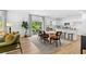 Open layout of dining area connected to a white kitchen, creating an inviting, flowing space at 465 Madison Lakeview Dr, Acworth, GA 30102