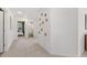 Upstairs hallway, leading to the bathroom and bedroom with decorative wall art at 465 Madison Lakeview Dr, Acworth, GA 30102