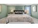 Comfortable main bedroom featuring a large bed, soft carpet, and minimalist decor at 465 Madison Lakeview Dr, Acworth, GA 30102