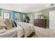 Bright primary bedroom with plush carpet, natural light, and tastefully decorated walls at 465 Madison Lakeview Dr, Acworth, GA 30102