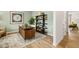 Stylish home office featuring a decorative desk, open shelving, and soothing green walls, perfect for a productive workspace at 465 Madison Lakeview Dr, Acworth, GA 30102