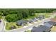 Aerial view of Champions Run new home construction surrounded by mature trees at 8599 Secretariat Dr, Lithonia, GA 30058