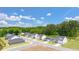 Aerial view of Champions Run new home construction surrounded by mature trees at 8599 Secretariat Dr, Lithonia, GA 30058