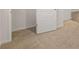Bedroom with neutral colored carpet and white trim at 8599 Secretariat Dr, Lithonia, GA 30058