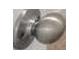 A brushed nickel doorknob at 8599 Secretariat Dr, Lithonia, GA 30058