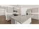 Kitchen with granite countertops, gray cabinets, and stainless steel appliances at 8599 Secretariat Dr, Lithonia, GA 30058