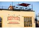 McCray's Tavern has a rooftop patio with a sign painted on the building at 2950 Scenic Lake Ct, Lawrenceville, GA 30045