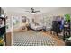 Bedroom featuring hardwood floors, two windows with lots of natural light, and ceiling fan at 440 River Valley Rd, Atlanta, GA 30328