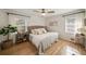 Bright bedroom with hardwood floors, neutral color palette, and large windows offering natural light at 440 River Valley Rd, Atlanta, GA 30328