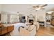 Cozy living room with a fireplace, ceiling fan and hardwood floors at 440 River Valley Rd, Atlanta, GA 30328