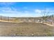 Large backyard featuring a black fence with a stunning view of the surrounding landscape at 4779 Mock Orange Sw St, Atlanta, GA 30331