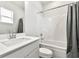 Well-lit bathroom with shower and tub features modern fixtures at 4779 Mock Orange Sw St, Atlanta, GA 30331