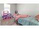 Well-lit bedroom features large window and carpet at 4779 Mock Orange Sw St, Atlanta, GA 30331