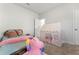 Bright bedroom with carpet and play tent at 4779 Mock Orange Sw St, Atlanta, GA 30331
