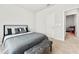 A well-lit bedroom with carpet and doorway at 4779 Mock Orange Sw St, Atlanta, GA 30331