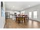 Bright dining area connected to the kitchen, featuring modern appliances, and lots of natural light at 4779 Mock Orange Sw St, Atlanta, GA 30331