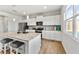 Stylish kitchen with stainless steel appliances, a center island, granite counters, and ample cabinet space at 4779 Mock Orange Sw St, Atlanta, GA 30331