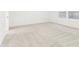 Large bedroom featuring plush carpet and two windows with lovely blinds at 1115 Lockhart Way, Douglasville, GA 30135
