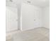 Bedroom features plush carpet, crisp white walls, and neutral decor at 1115 Lockhart Way, Douglasville, GA 30135