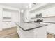 Modern kitchen with granite countertops and stainless steel appliances at 1115 Lockhart Way, Douglasville, GA 30135