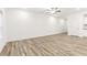 Spacious living room with hardwood floors and neutral paint at 1115 Lockhart Way, Douglasville, GA 30135