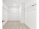 Walk-in closet provides ample storage with wire shelves and neutral carpet, ready for organization at 1115 Lockhart Way, Douglasville, GA 30135