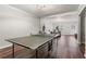 Spacious basement with wood floors, offering potential for a home gym or recreation area at 1380 Tennis Court Pl, Roswell, GA 30075
