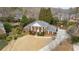 Stately brick home with a manicured front yard and mature trees, creating an inviting curb appeal at 1380 Tennis Court Pl, Roswell, GA 30075