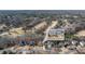 Aerial shot of community homes near the golf course with an inset picture of the featured home at 5945 Masters Club Dr, Suwanee, GA 30024