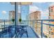 Balcony with seating and city views at 1065 Peachtree Ne St # 3105, Atlanta, GA 30309