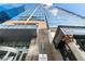 Exterior shot of building featuring modern architecture, a hotel entrance, and glass windows at 1065 Peachtree Ne St # 3105, Atlanta, GA 30309