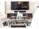 Beautiful living room features a modern fireplace, sleek television, and decorative coffee table at 1065 Peachtree Ne St # 3105, Atlanta, GA 30309