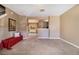 Inviting living space showcases neutral decor, plush carpeting, with a view to a light-filled dining area at 2258 Bigwood Trail Trl, Atlanta, GA 30349