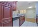 Kitchen features granite countertops, stainless steel appliances, and dark wood cabinetry at 4206 Santa Fe Pkwy, Atlanta, GA 30350