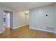 Neutral living room features wood floors, white trim, and ample natural light at 4206 Santa Fe Pkwy, Atlanta, GA 30350