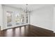 Bright dining area with hardwood floors and access to a private balcony at 8026 Rivermont Ct, Snellville, GA 30039