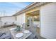 Cozy balcony with outdoor dining set and ambient string lights at 1376 Stirling Nw Cir, Atlanta, GA 30318