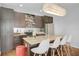 Bright kitchen featuring stainless steel appliances, granite counters, and a center island with bar stool seating at 1376 Stirling Nw Cir, Atlanta, GA 30318