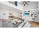 Bright living room with built-in shelving, hardwood floors, large windows, and comfortable seating at 1376 Stirling Nw Cir, Atlanta, GA 30318