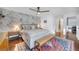 Relaxing main bedroom with gray accents, patterned wallpaper, and bench seating at 1376 Stirling Nw Cir, Atlanta, GA 30318