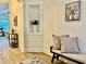 Bright entryway featuring a decorative niche, bench seating, and hardwood-style floors at 2016 Barberry Dr, Buford, GA 30519