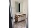 Efficient bathroom with toilet, sink, mirror, and vanity, offering storage at 3133 West Point Cir, Douglasville, GA 30134